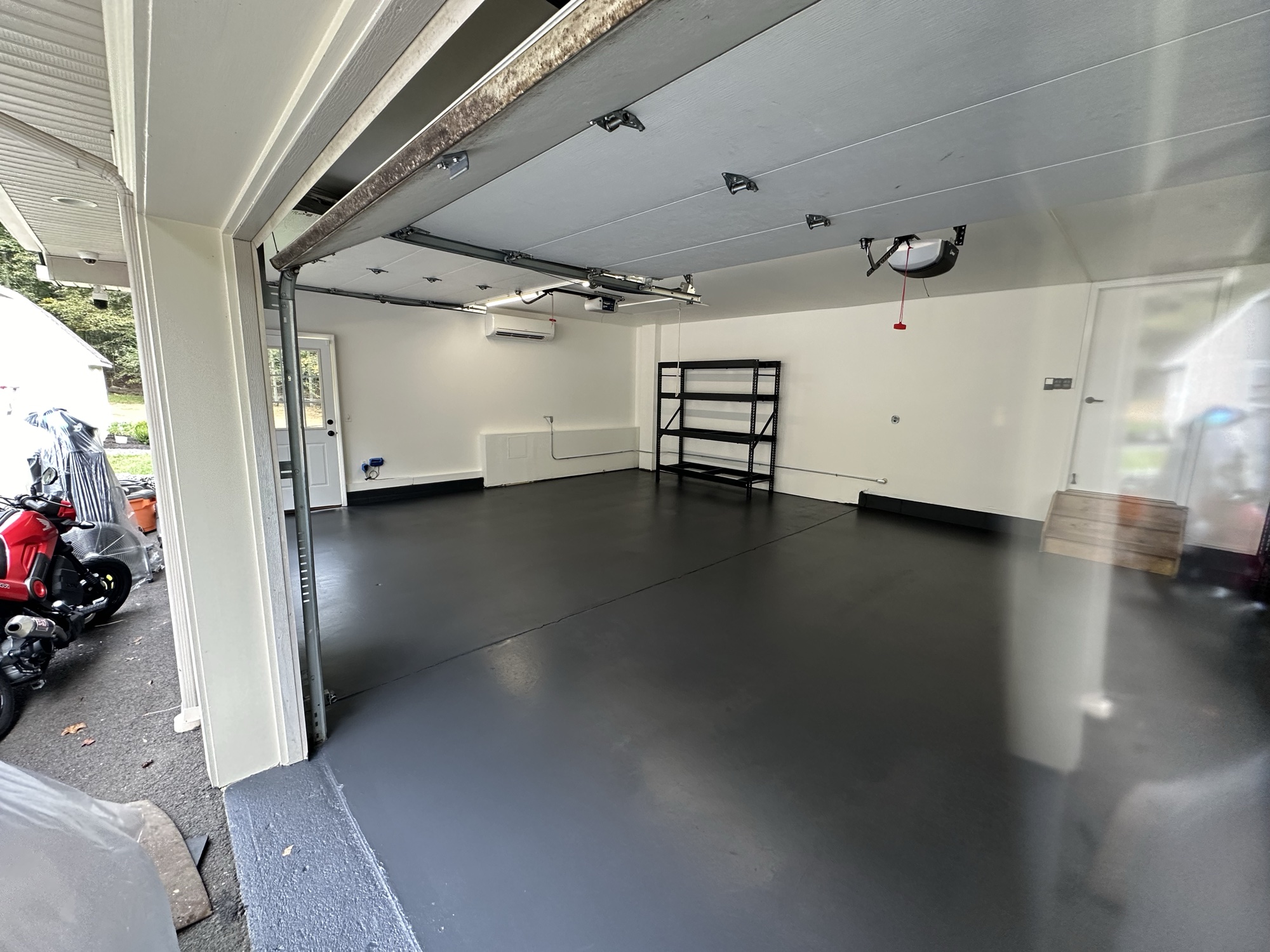 Dark gray garage floor coating by J&B Painting