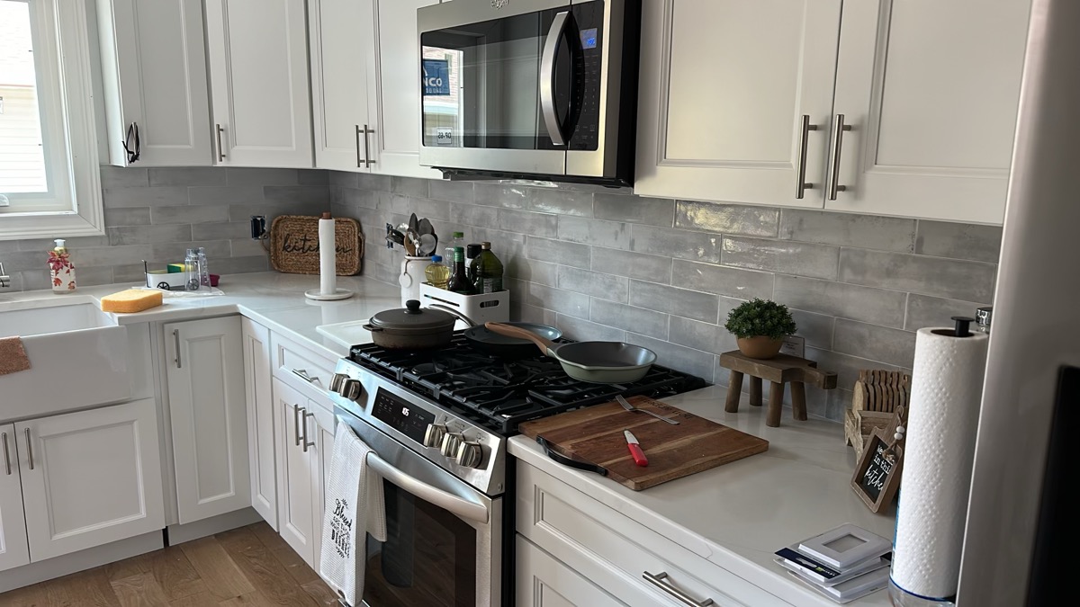 White shaker kitchen cabinets professionally refinished