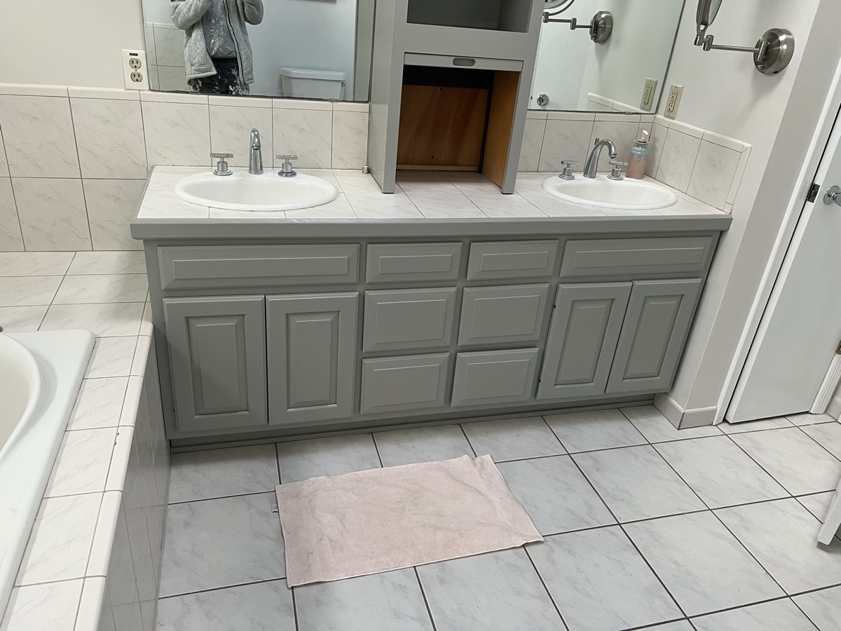 Refinished gray bathroom vanity front view by J&B Painting