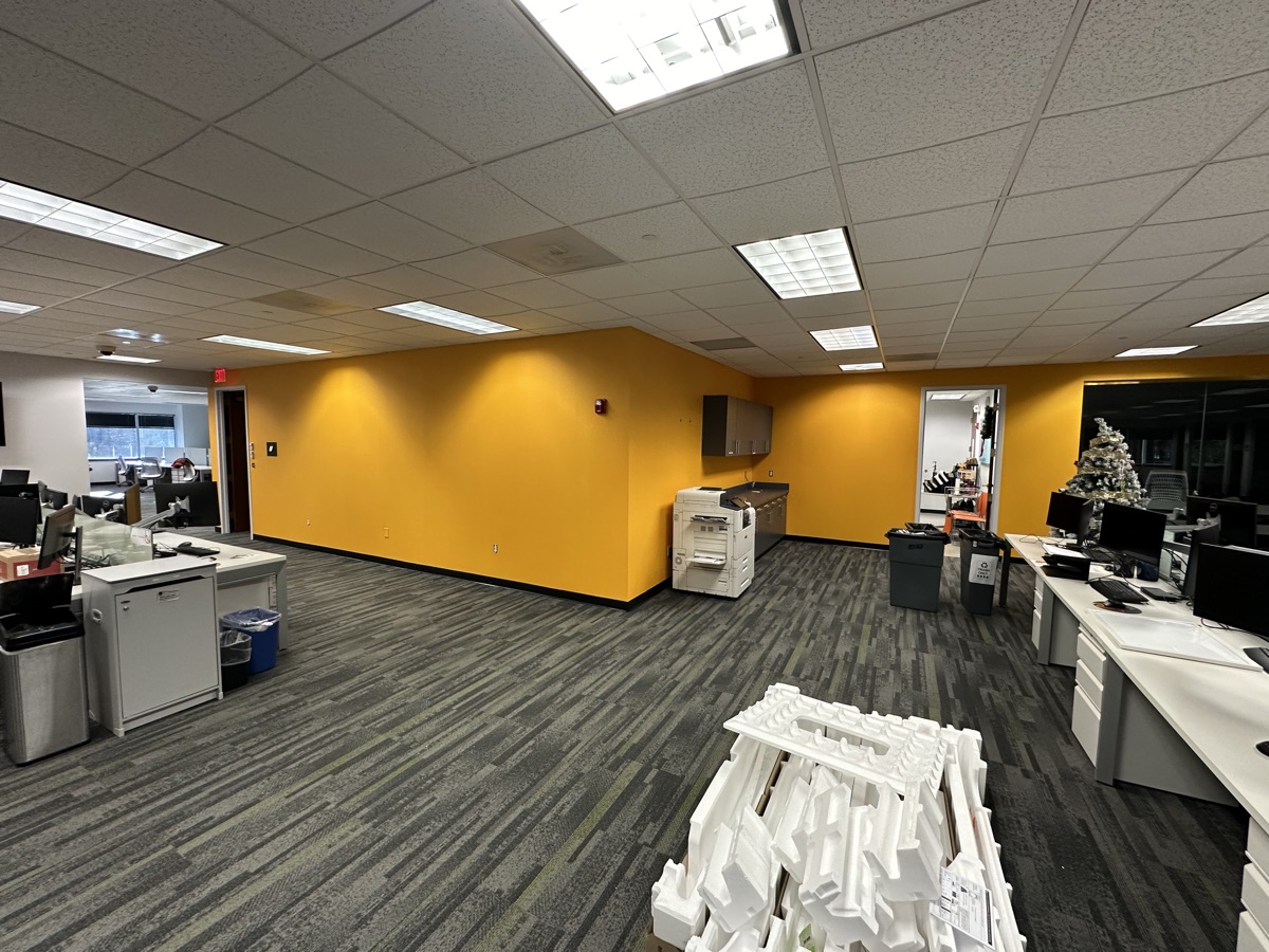 Corporate office yellow accent walls alternate view by J&B Painting