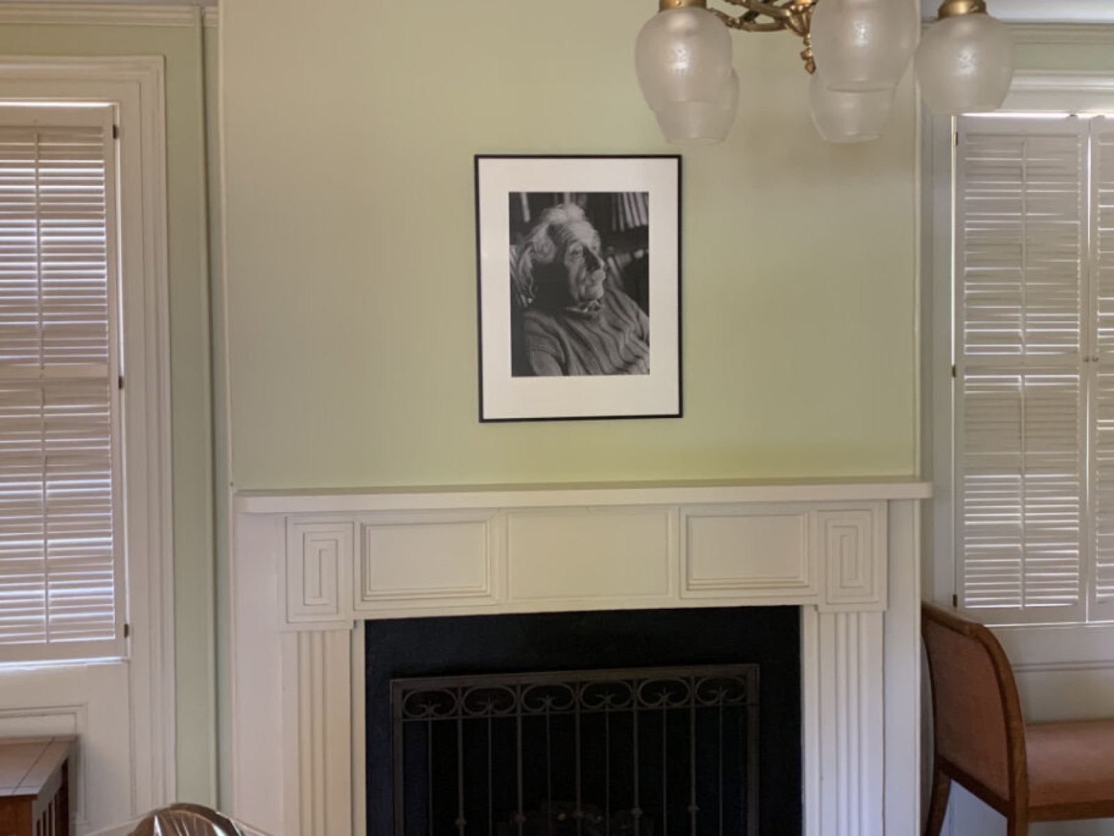 Historic building interior painting with fireplace mantel