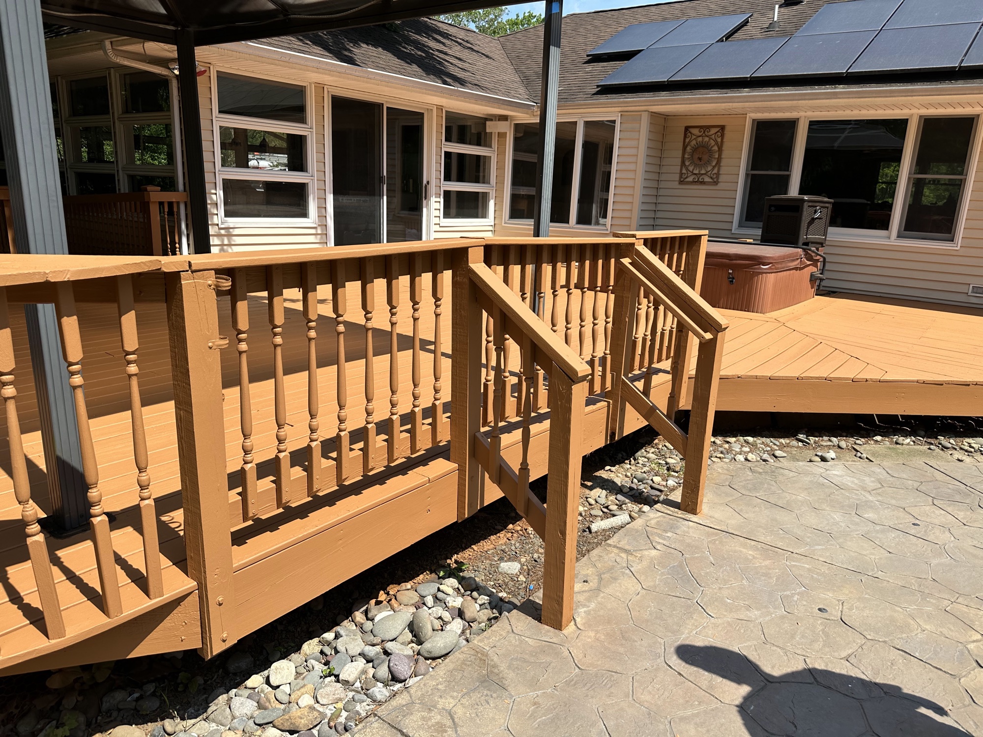 Stained deck and exterior siding by J&B Painting