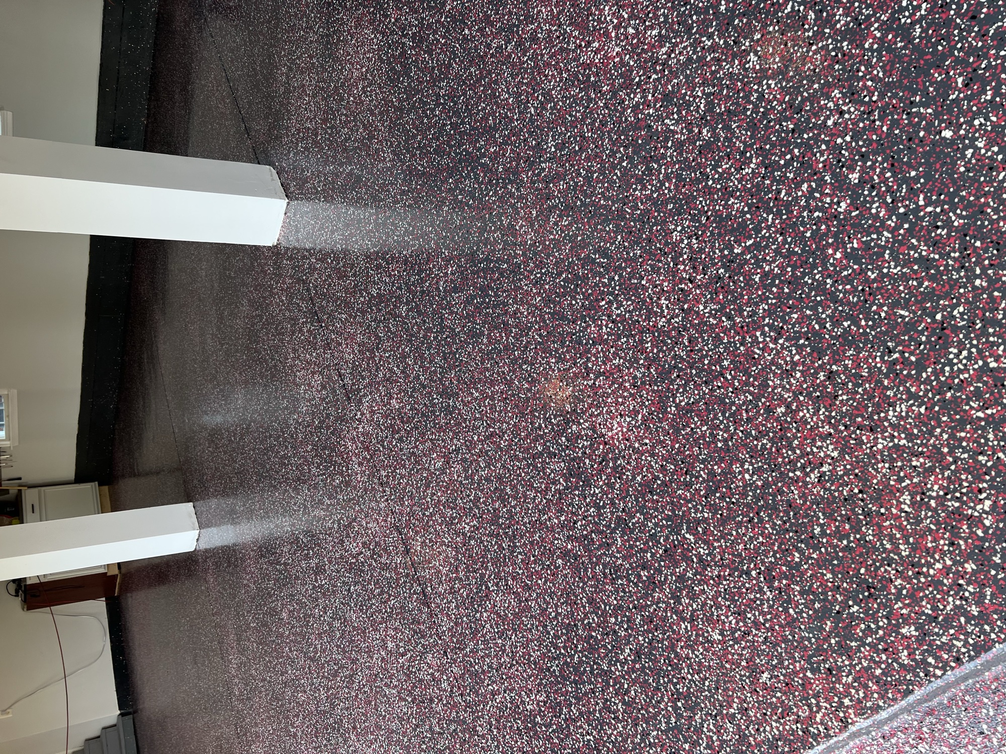Epoxy flake floor in garage by J&B Painting