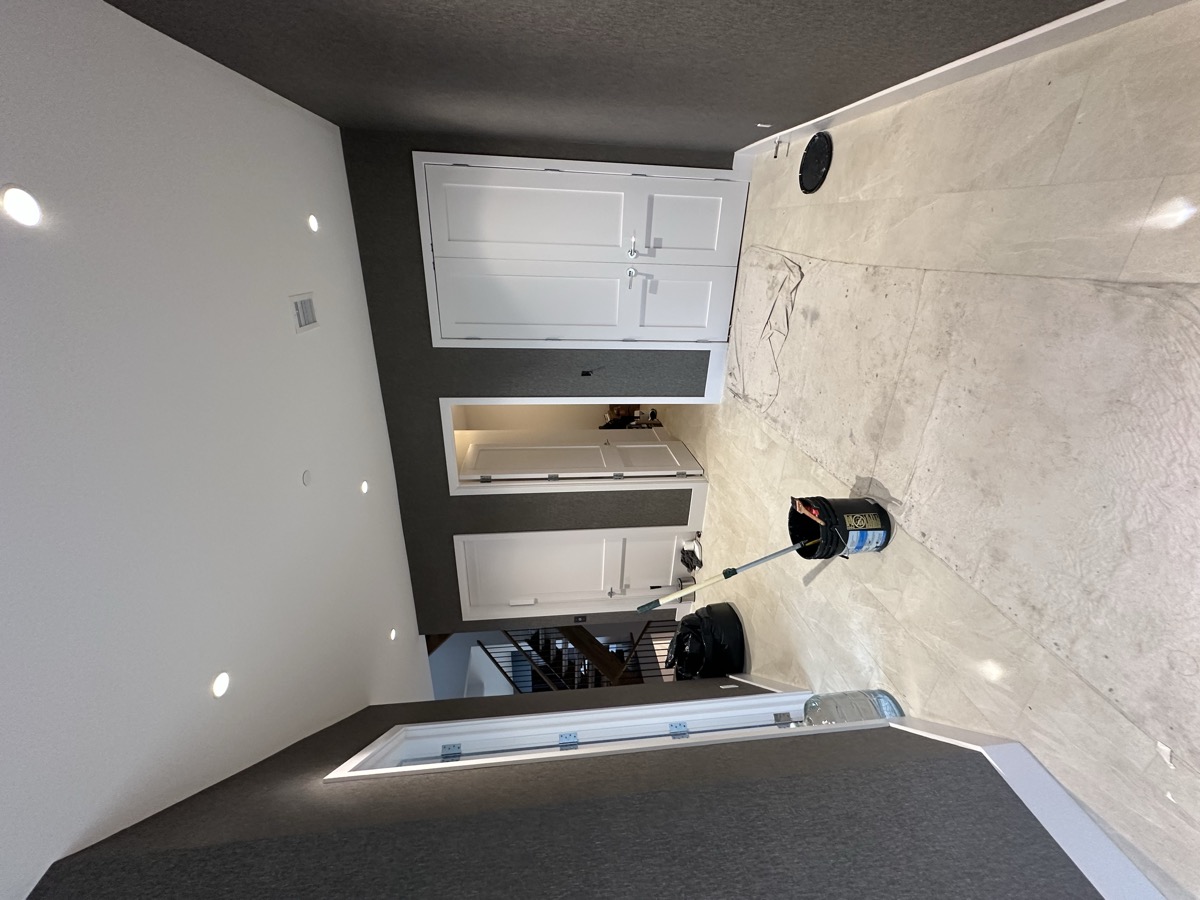 Modern dark walls with white cabinetry wallpaper installation
